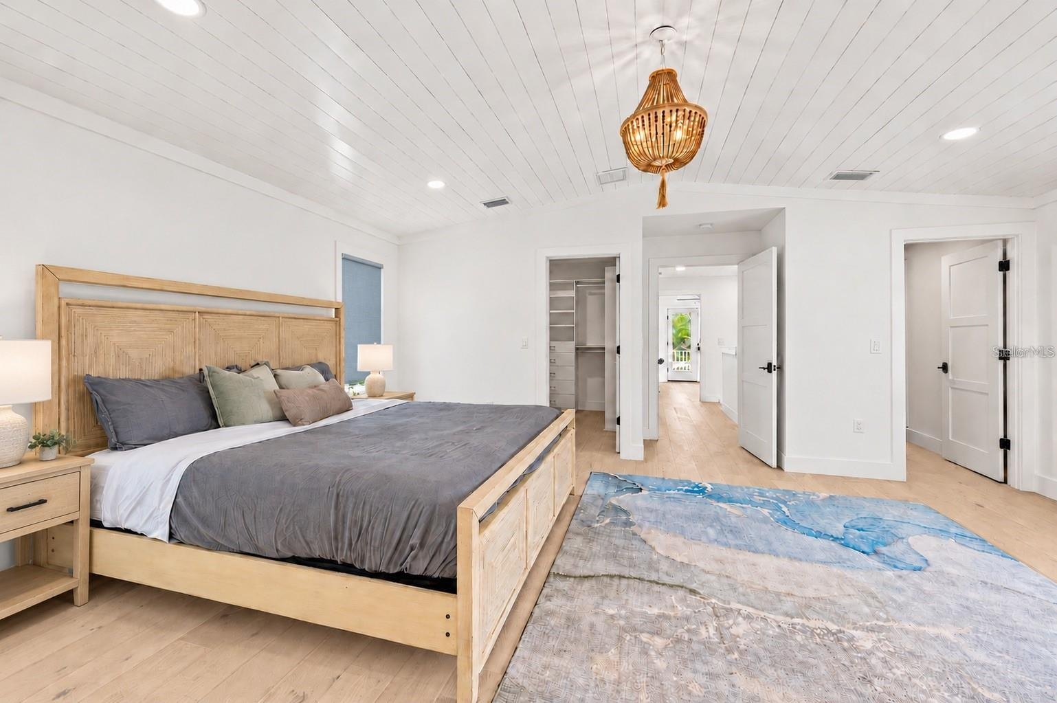 Primary suite with vaulted ceiling