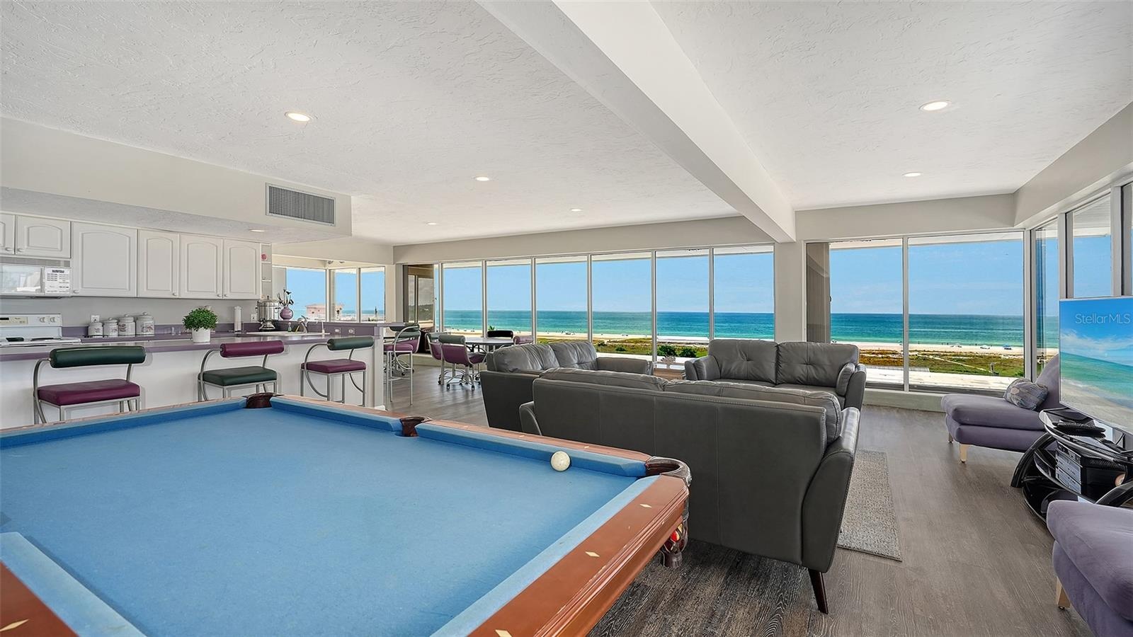 Club Room with plenty of seating, Pool table and kitchen