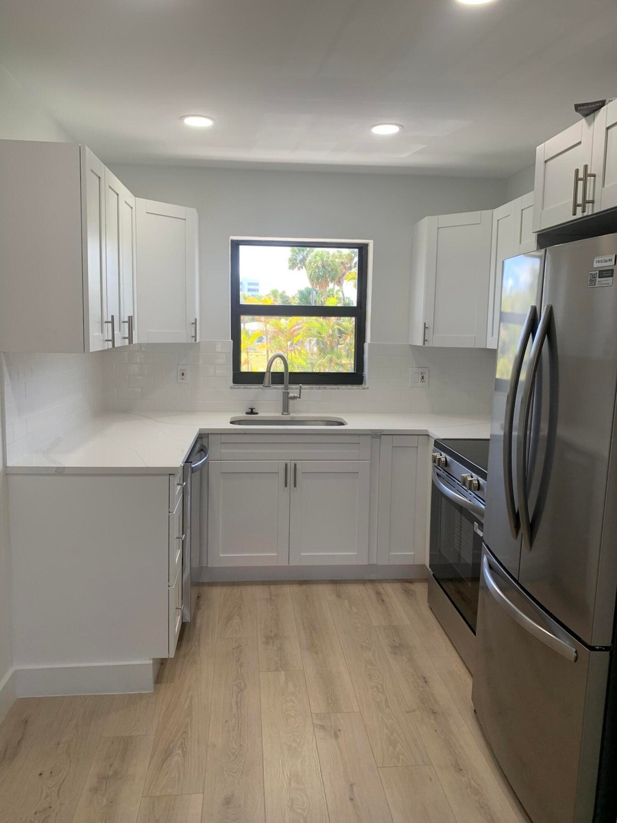 Brand New Appliances, cabinets and Floors