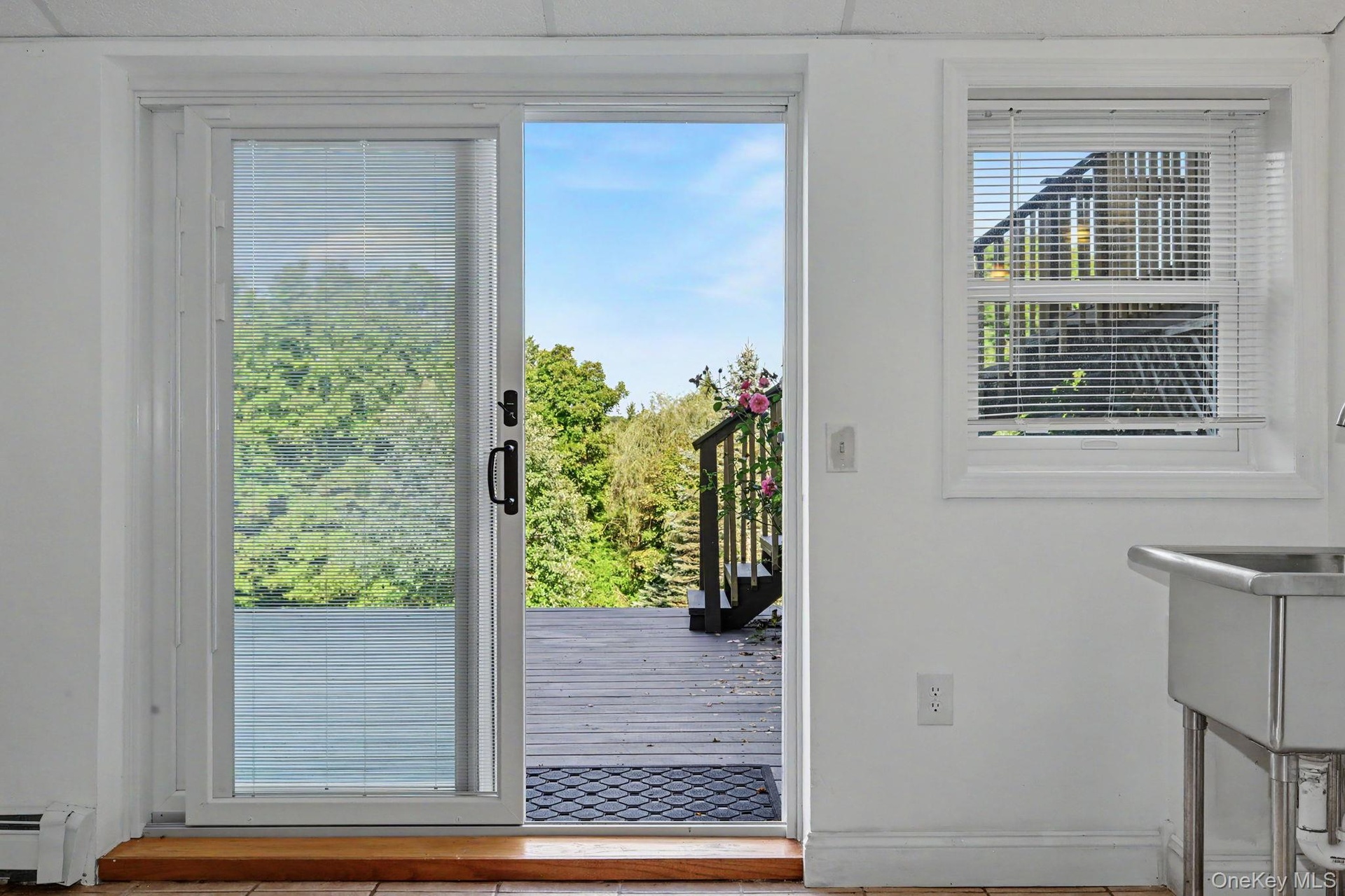 Lower Level access to deck and backyard