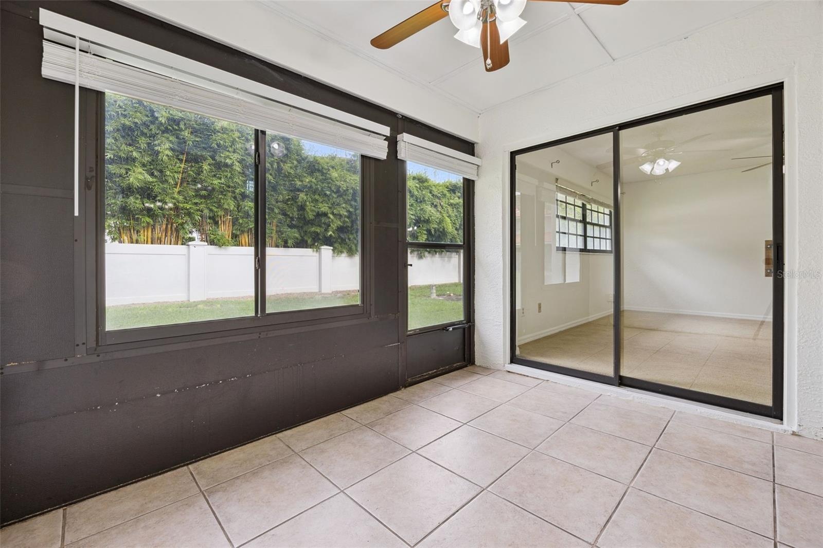Lanai with access to primary bedroom and living room