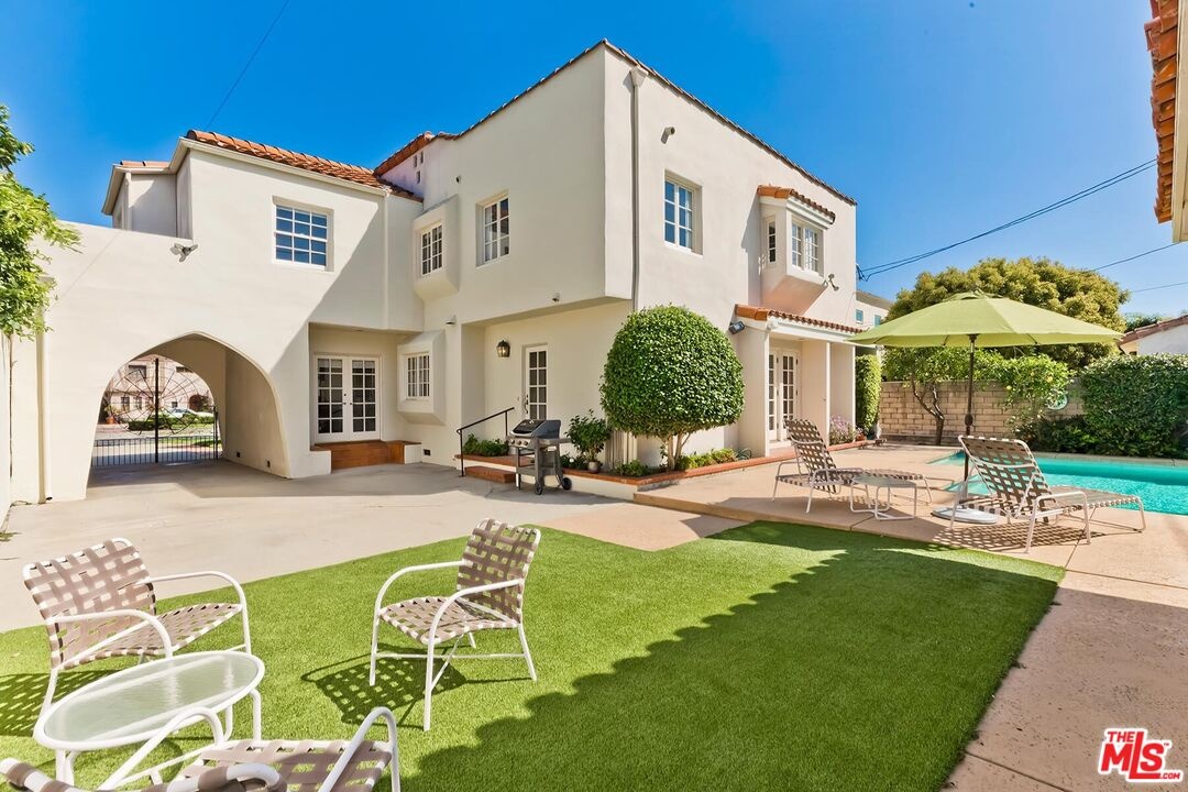 Yard, Pool, and Rear Elevation