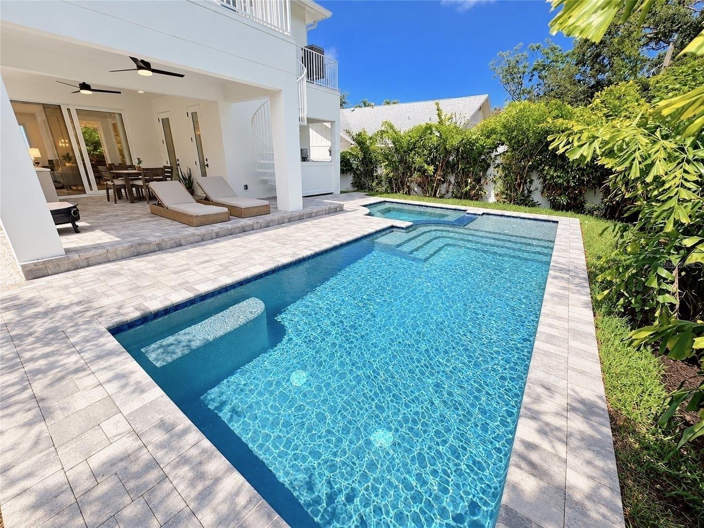 Heated saltwater pool and hot tub spa