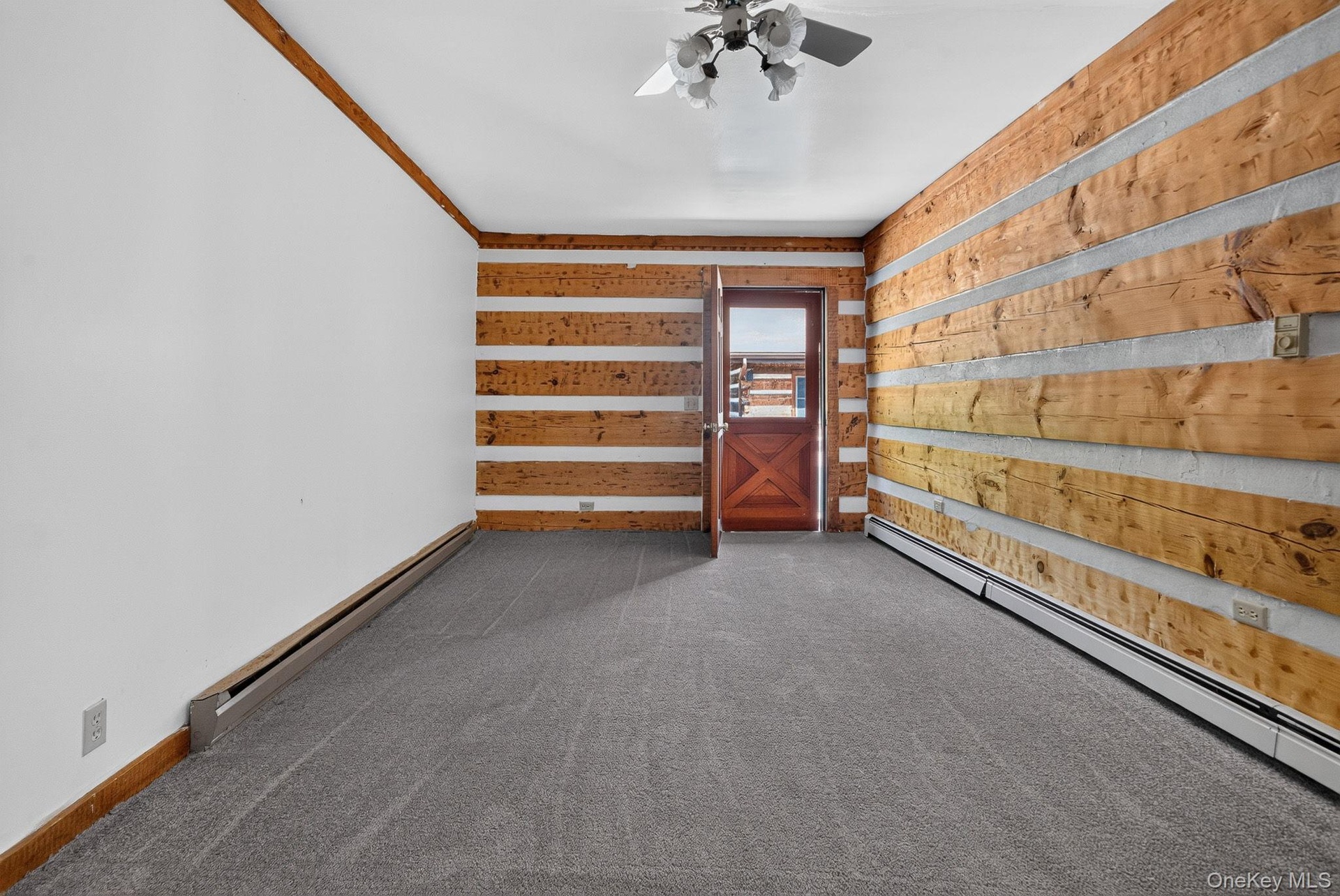 Residence #2 - second bedroom.  Access to courtyard and garage.  Petite full bathroom.  Generous closet.