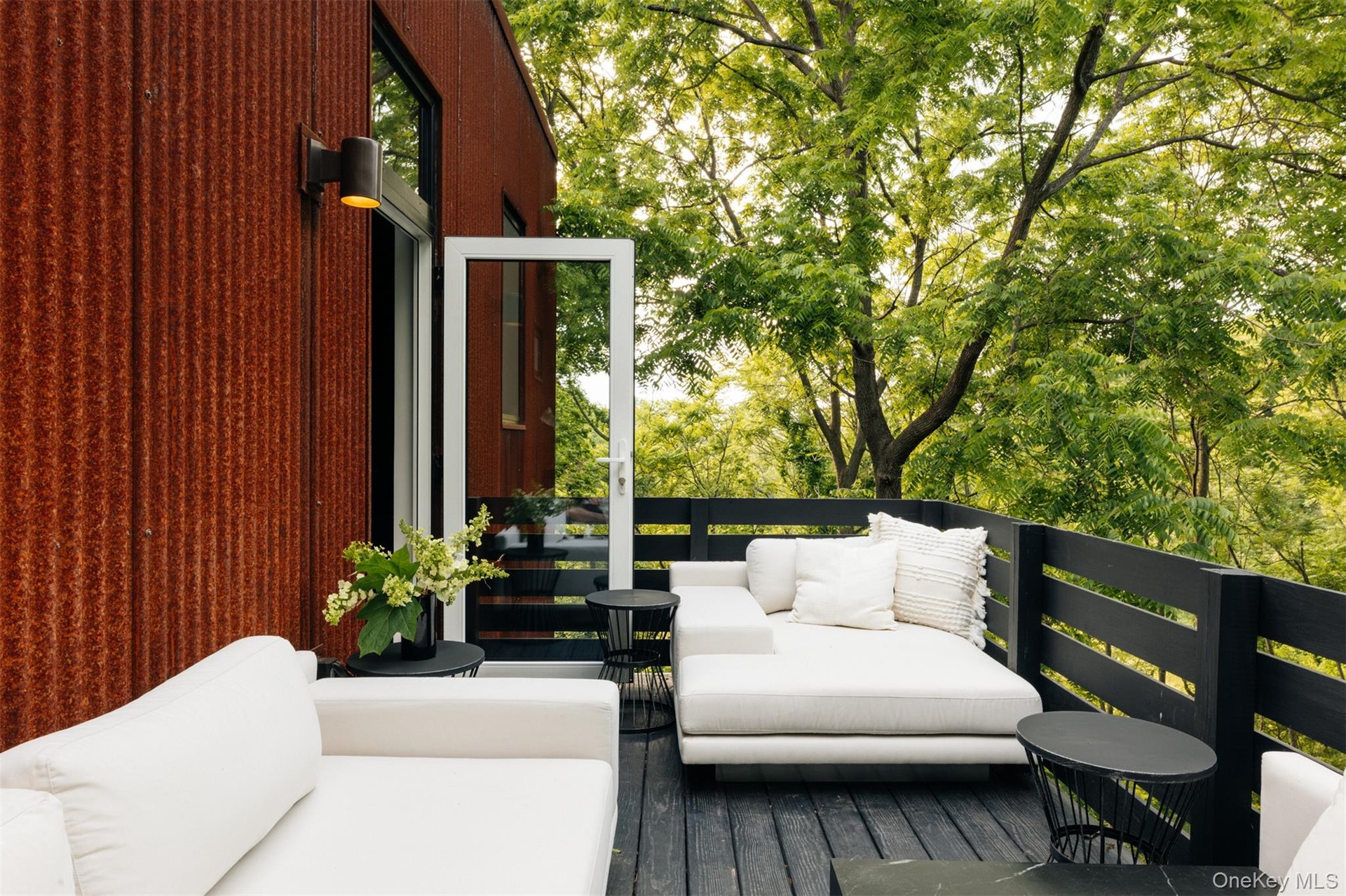 Wooden deck with outdoor lounge area