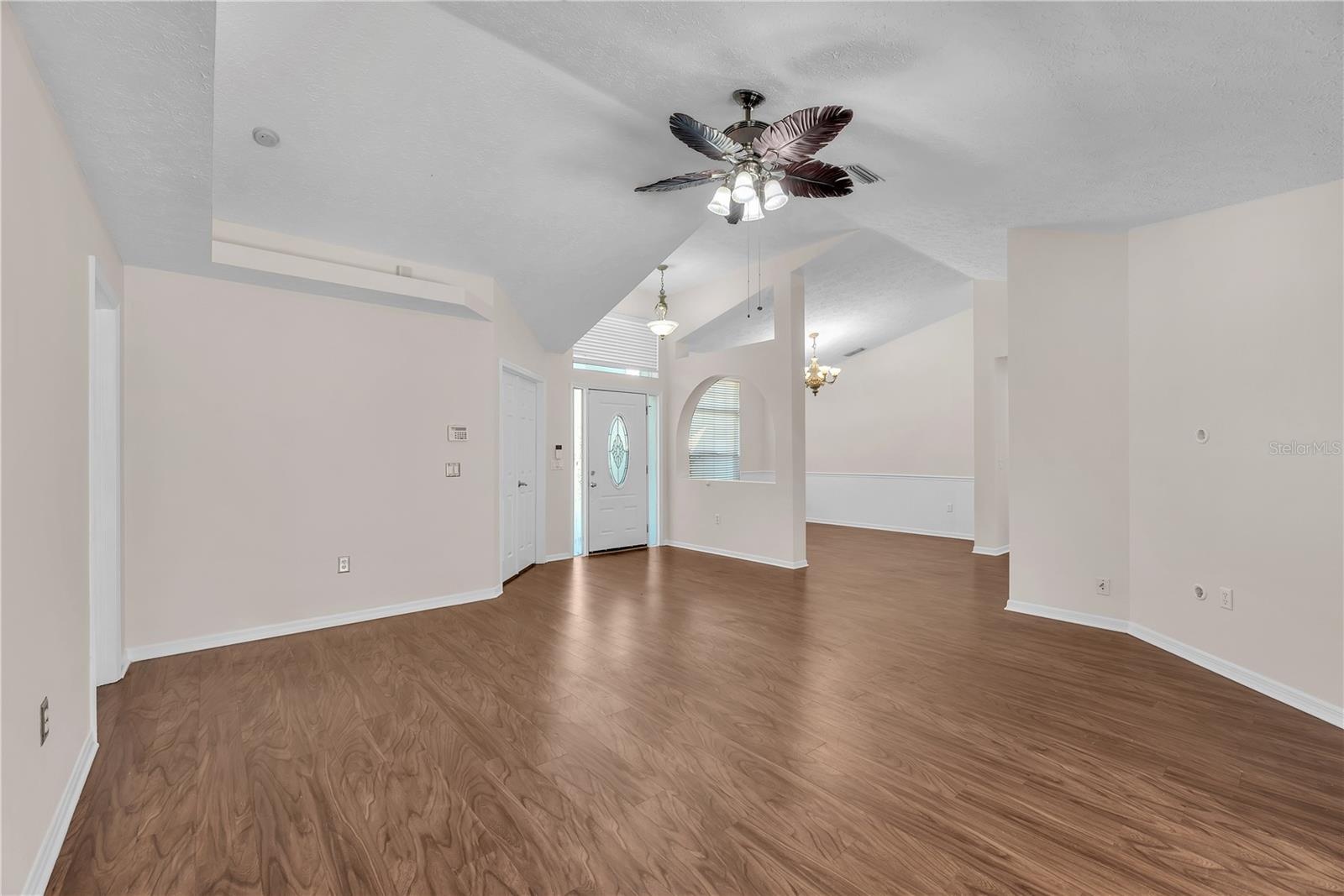 Vaulted ceilings make this living/dining room combination feel open and spacious.