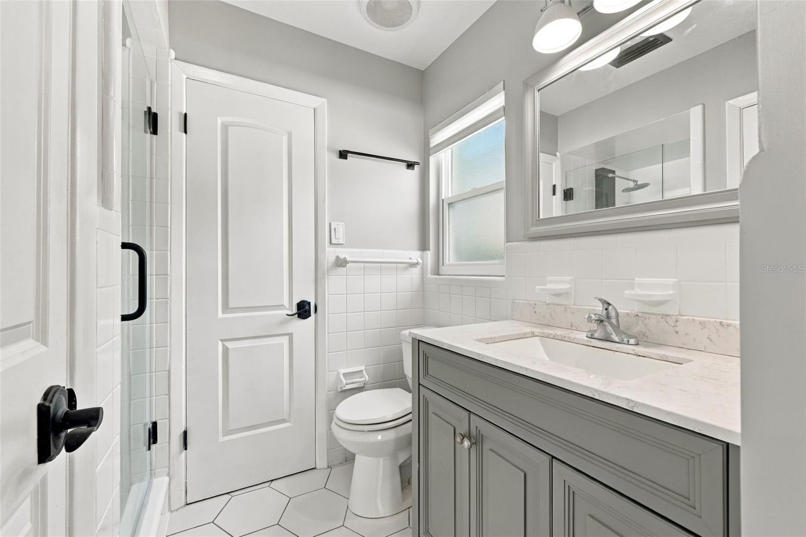 The primary bathroom has been nicely updated.