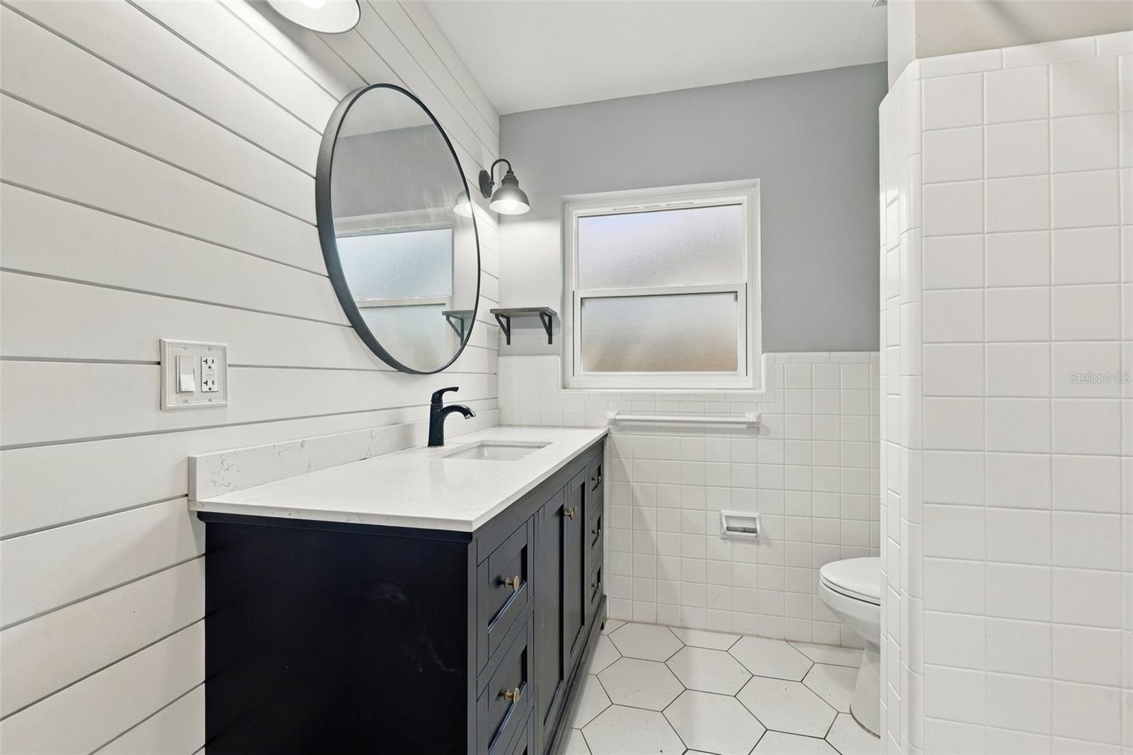 Bathroom 2 with tub/shower combination.