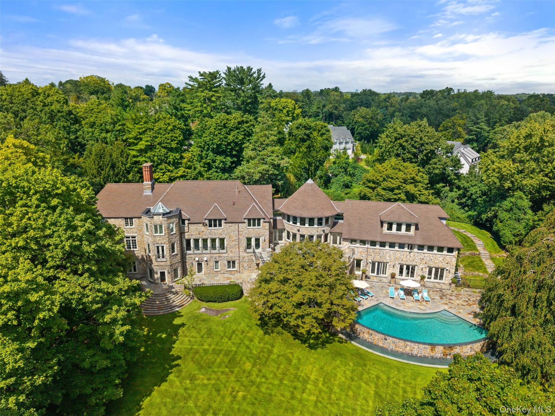 Welcome to Four Winds an incredible renovated estate set on 3 acres