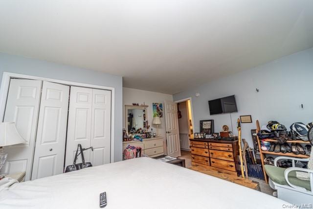 Room featuring light-colored walls and a flat ceiling