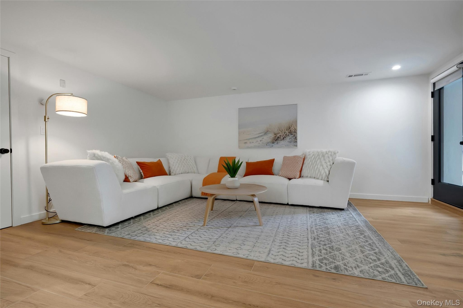 A fantastic open lower level with great ceiling height, tons of flexible space, and direct walk-out access to the backyard!