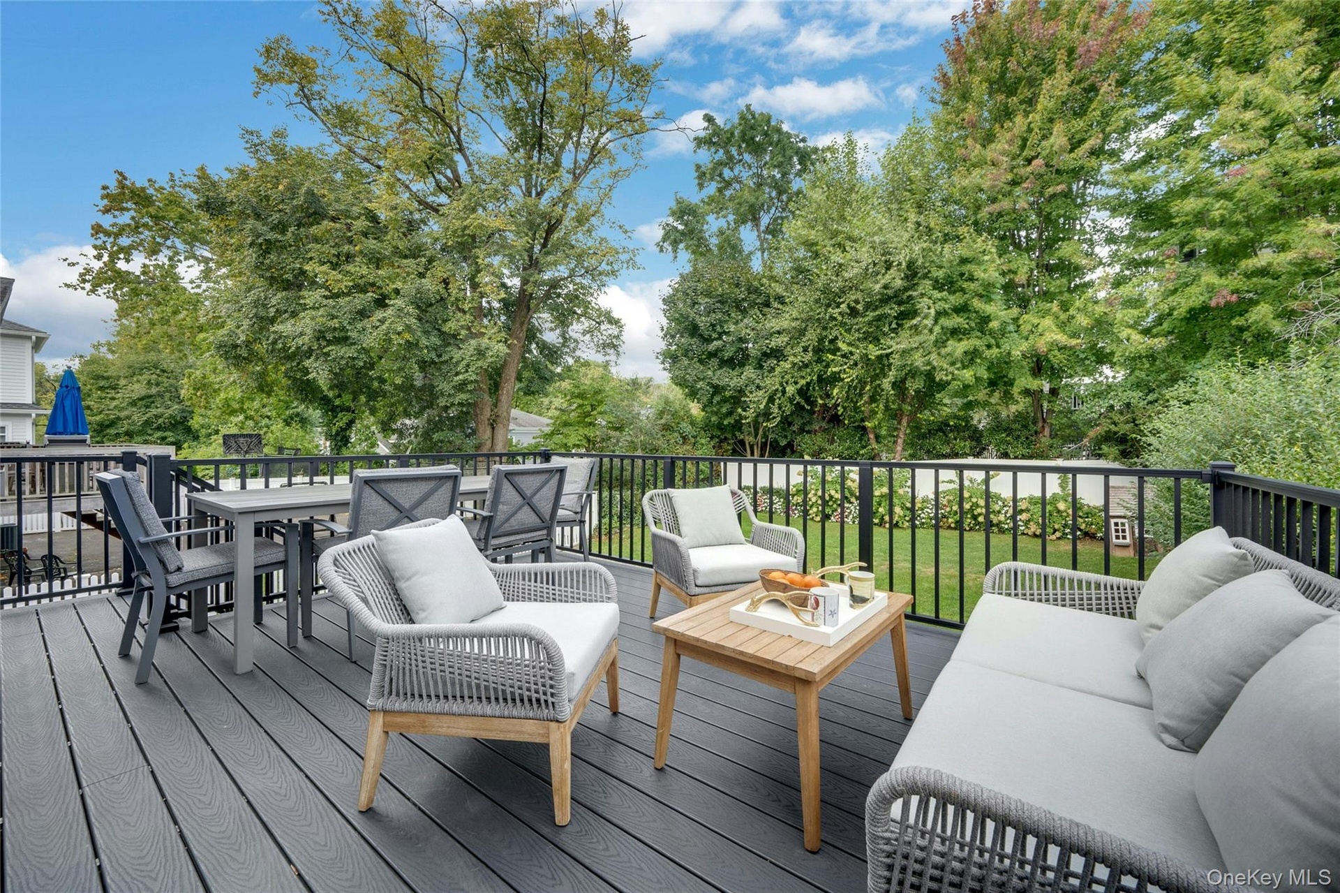The deck right off the kitchen creates a seamless connection between indoor and outdoor living.
