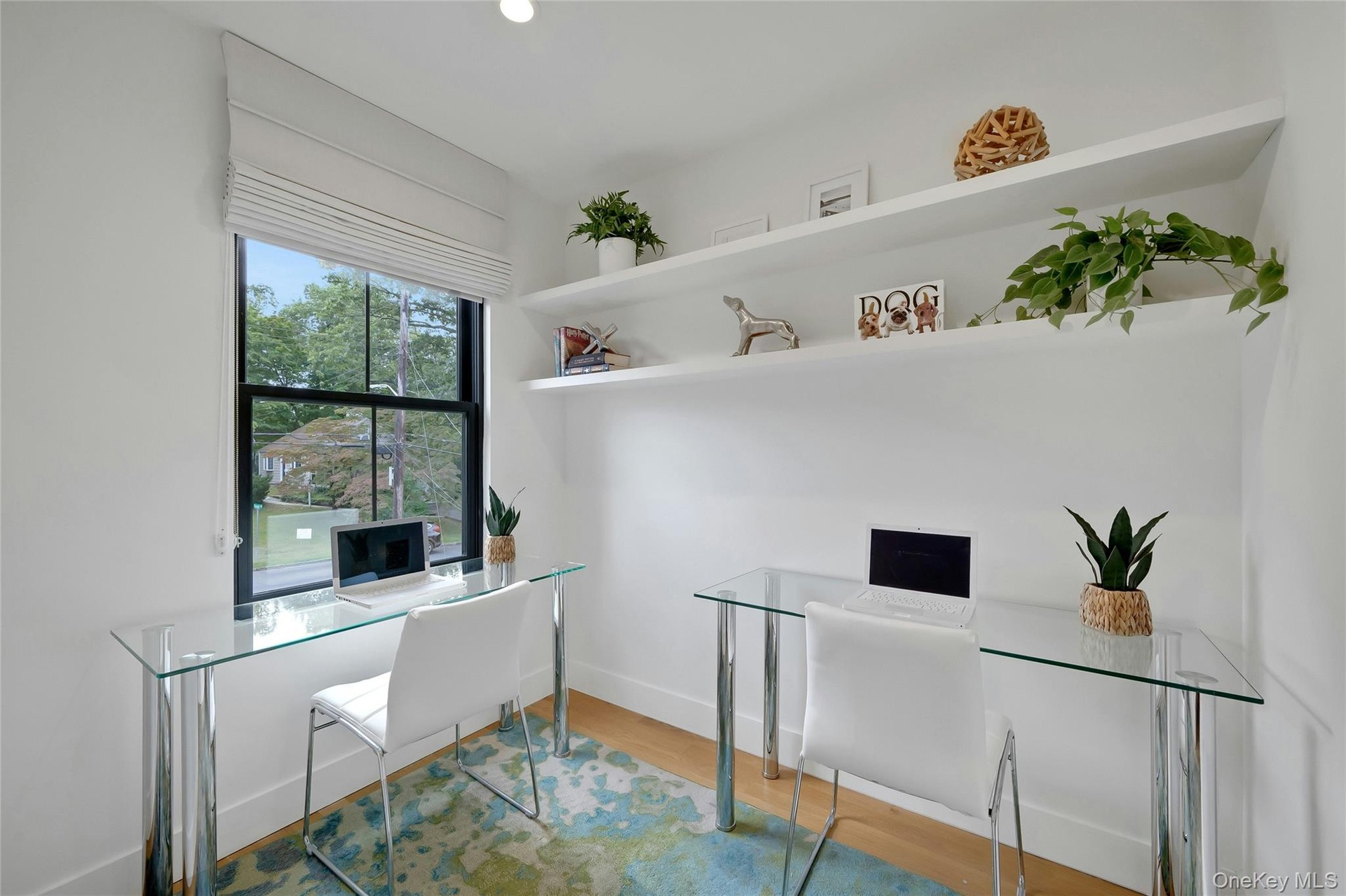 Bonus space, shown here with 2 desks, can easily become a reading nook, play space, home office... whatever works for your family.