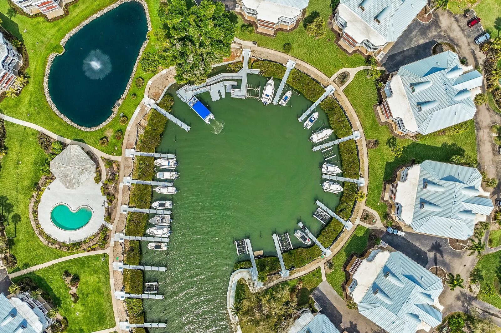 Newly renovated boat basin - low profile lifts can be installed by those who lease a slip after the Closing.
