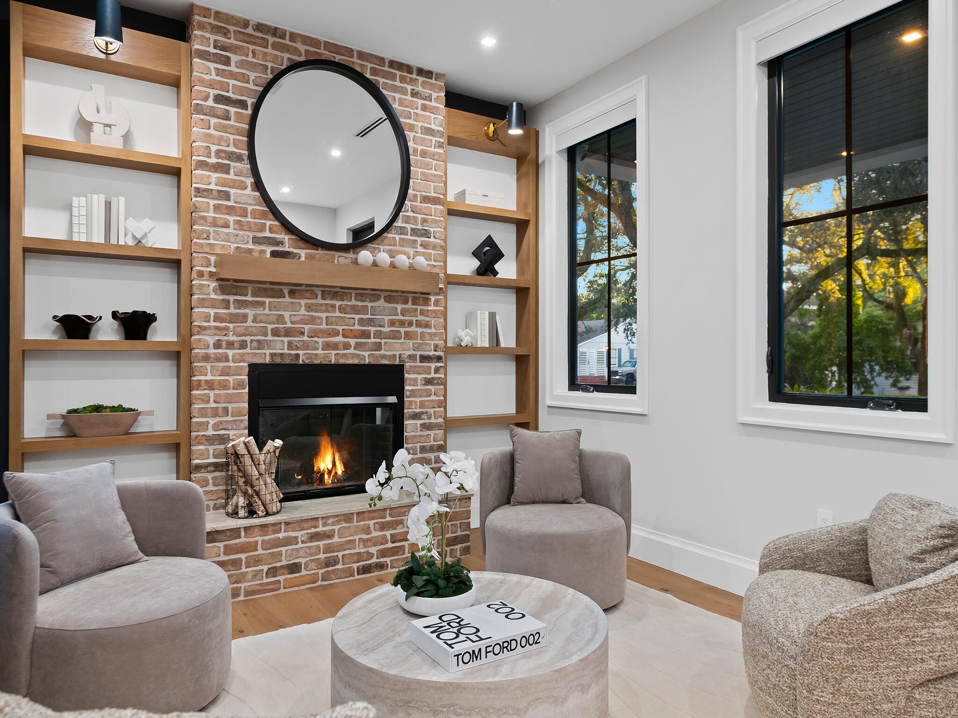 Living room with fireplace and built-in shelving