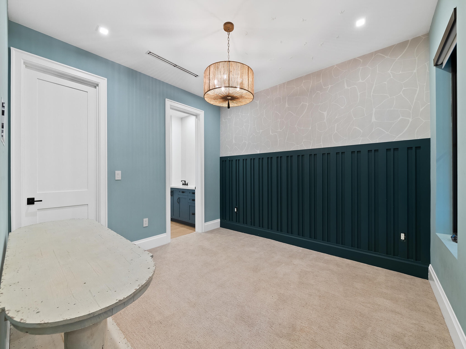 Upstairs loft with blue wainscoting