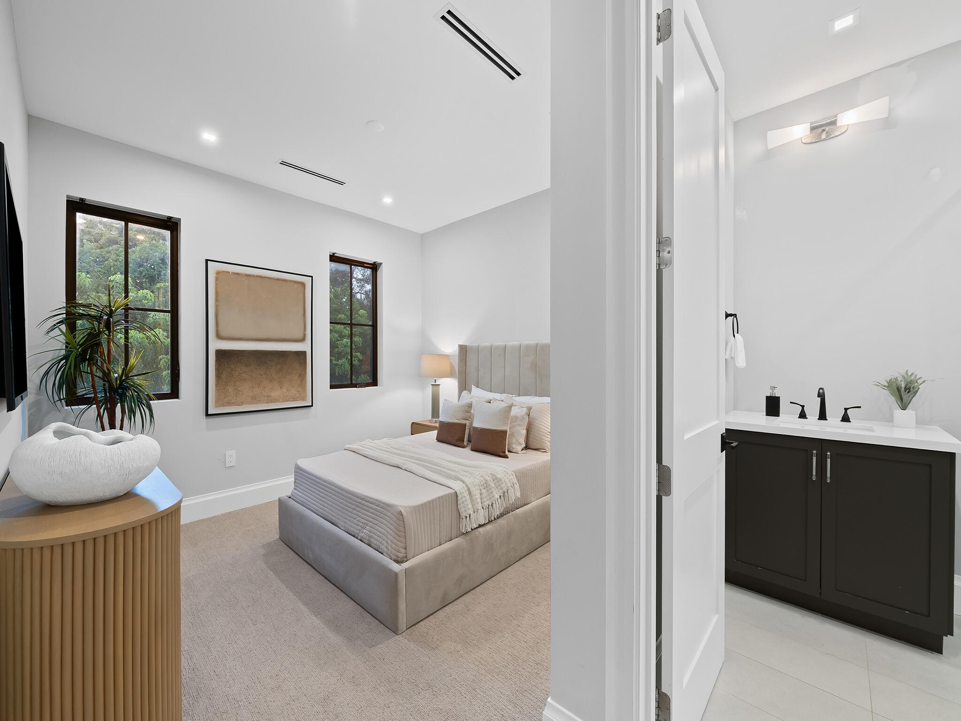 Bedroom with dark wood accents