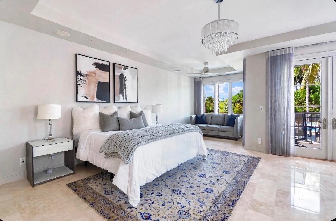 with French doors opening onto the balcony