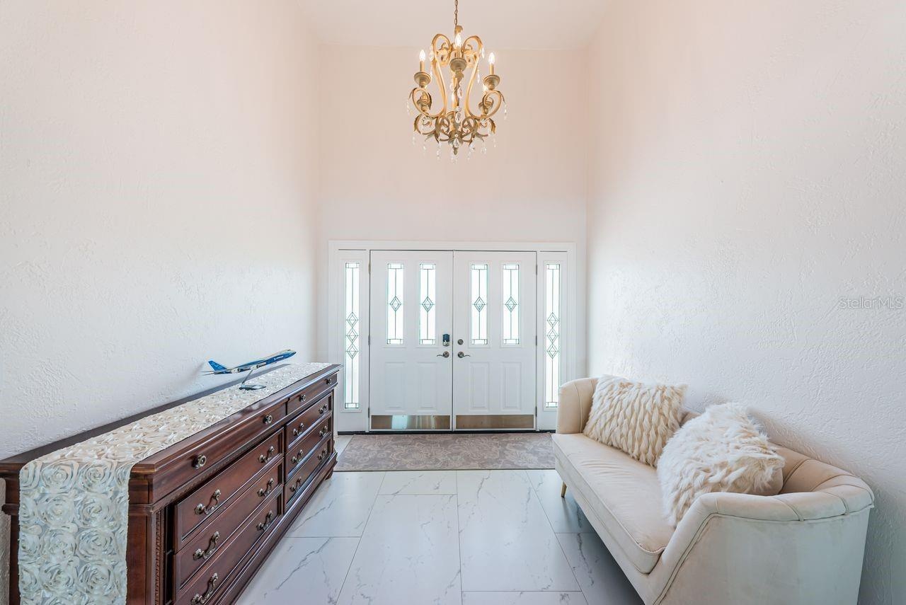 Foyer entry with vaulted ceiling
