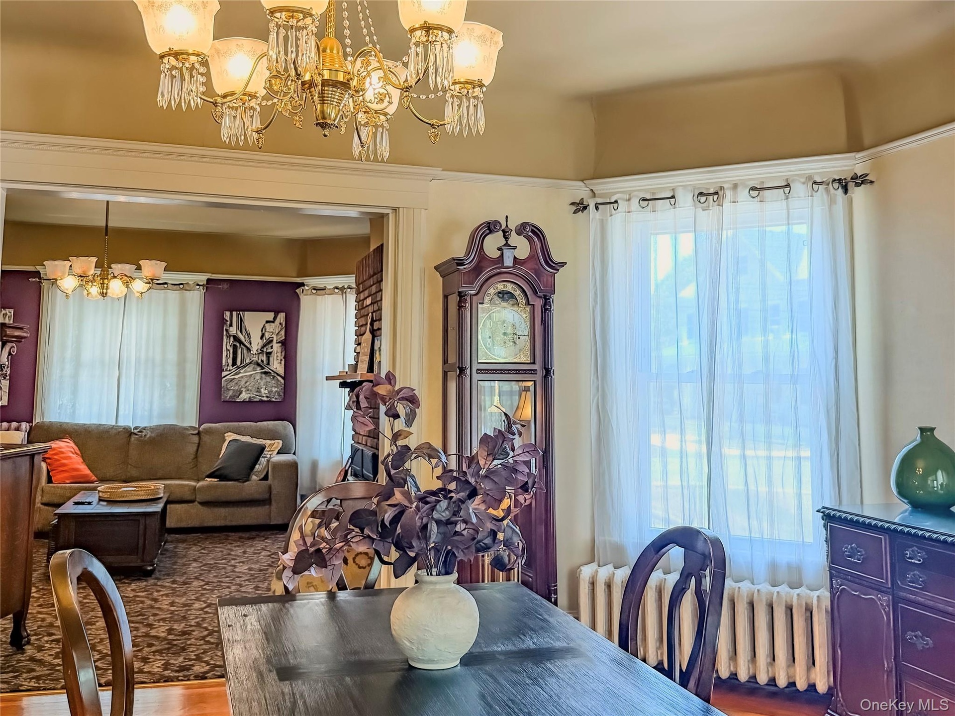 Main House Dining Room with Ornate chandelier with crystal accents