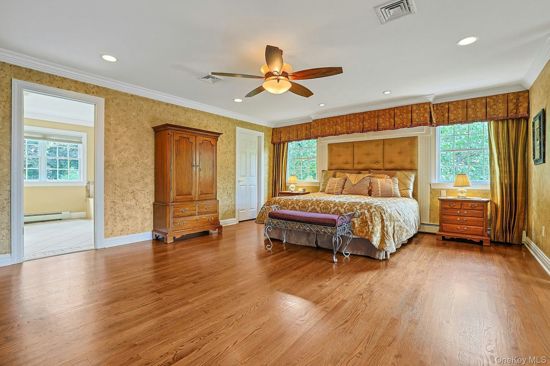 The Primary Suite Abounds W/Beautiful Hardwood Floors, Recessed Lighting Large Walk-in California Closet Built-in's