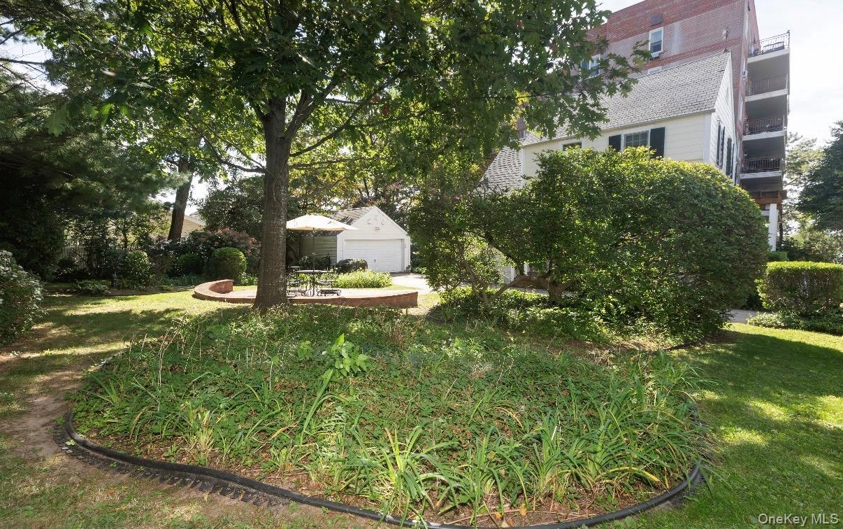 Many beautiful flowering trees, shrubs and bushes throughout the yard