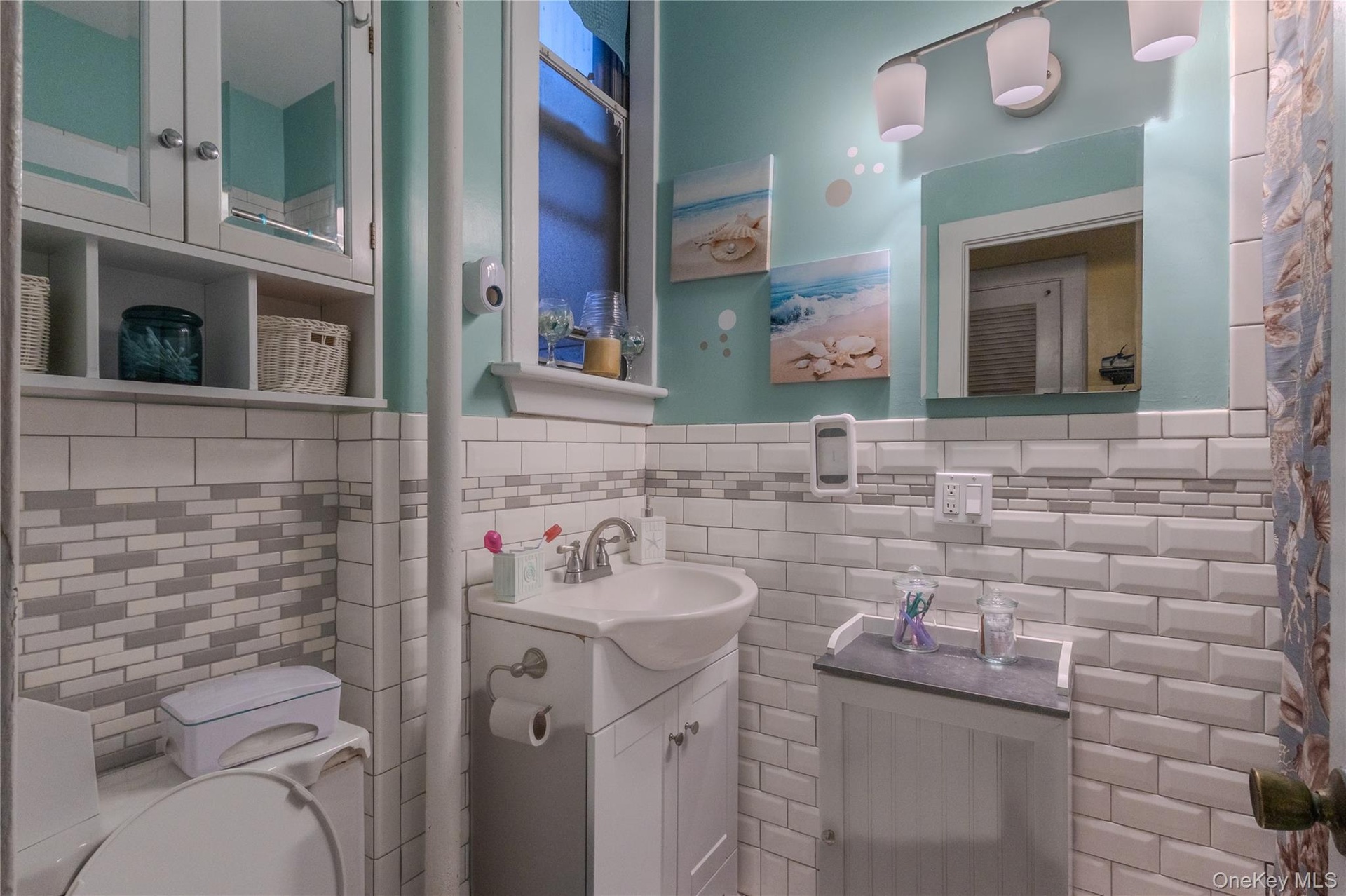 White subway tile with a decorative accent band