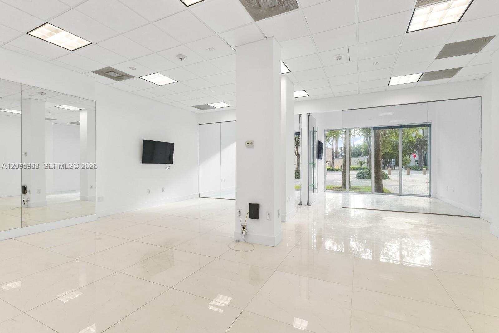 Main open area with column, storefront beyond