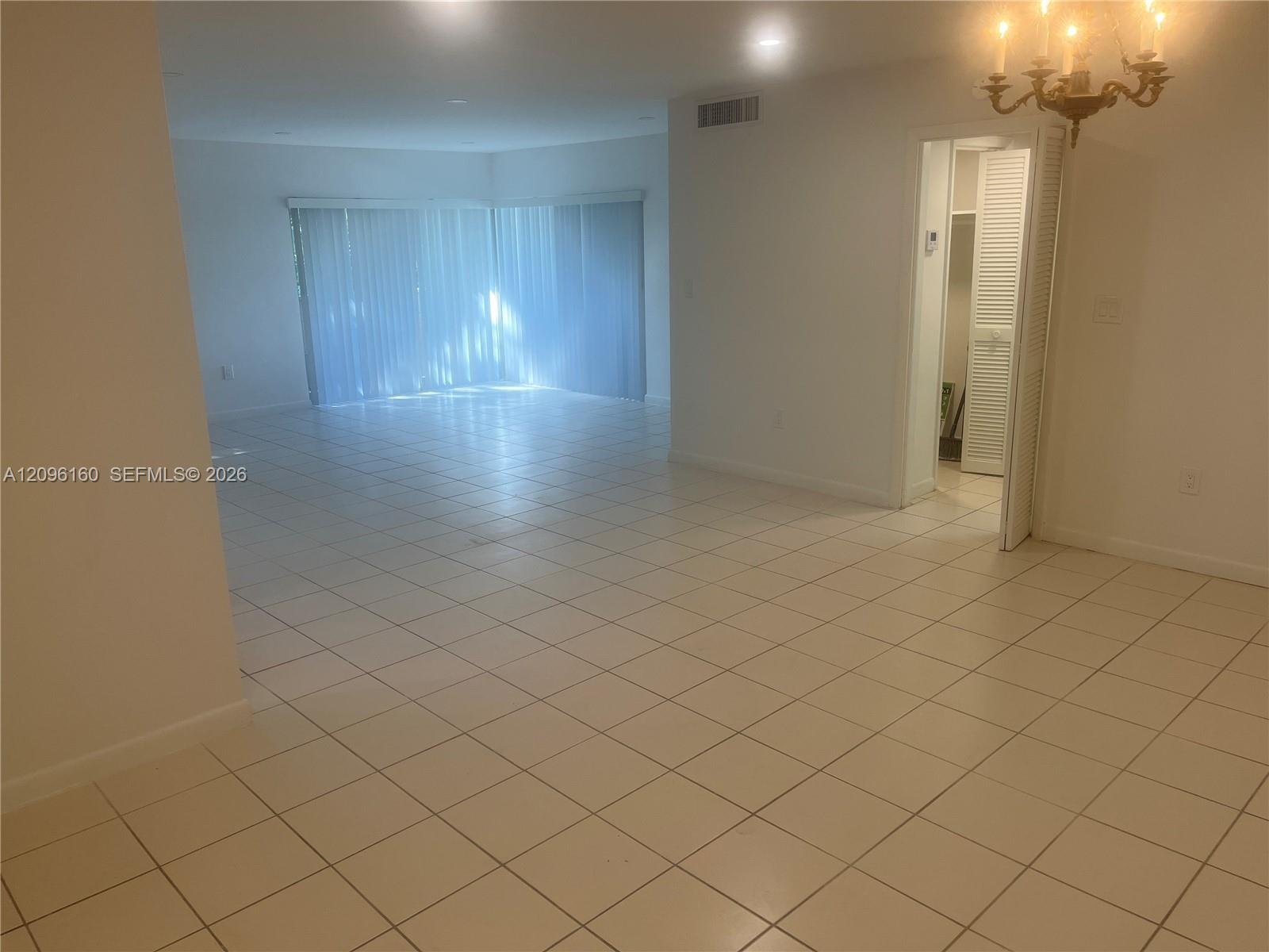 Huge Living Room with Slider to Wrap-Around Balcony