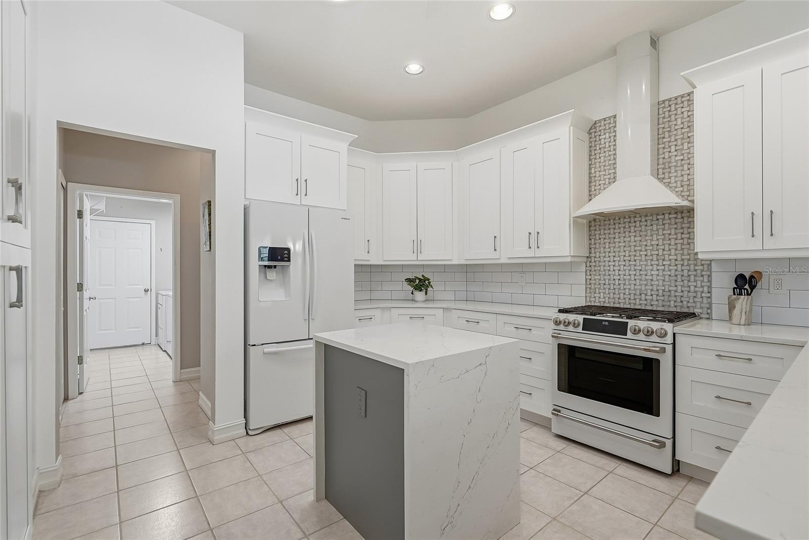 High ceilings with exceptional natural light, this fresh kitchen is a home run.