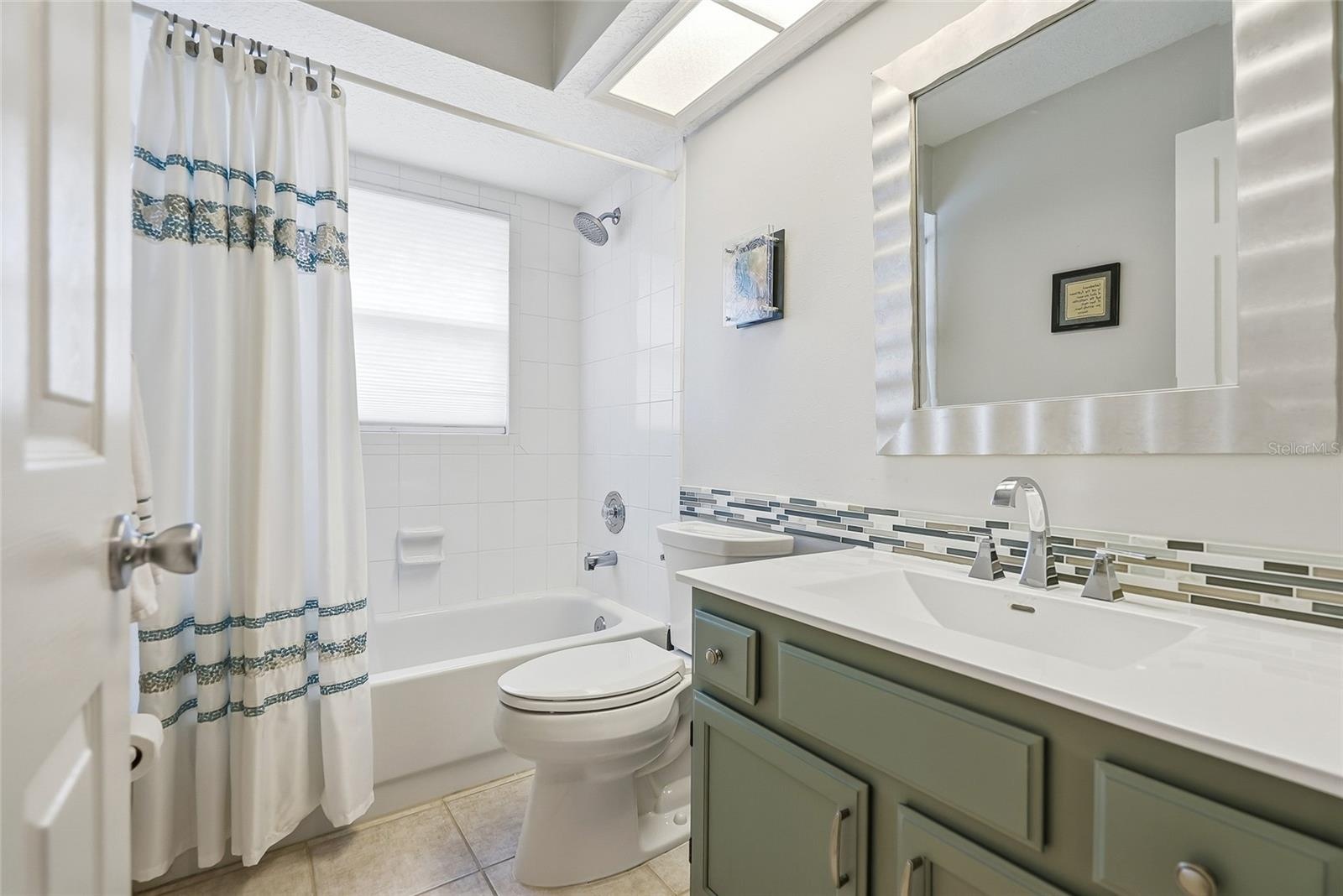 Hall Bathroom with tub.