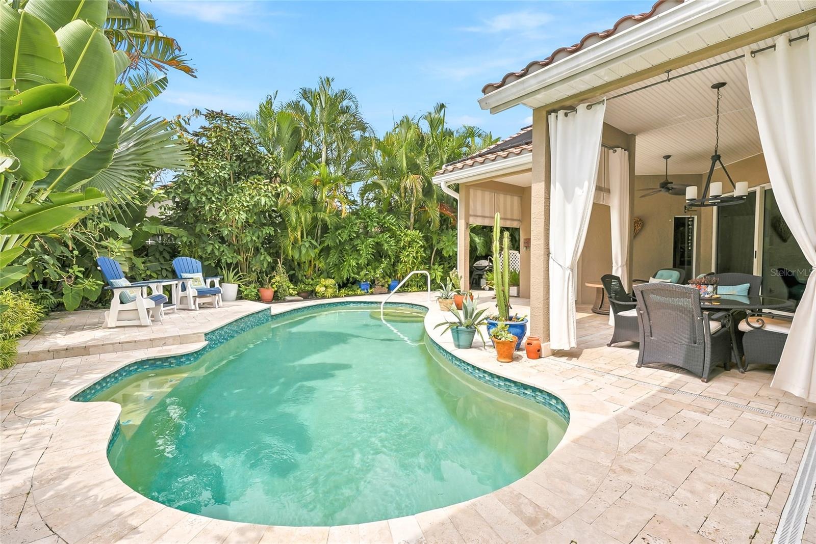 Solar-heated pool perfect for swimming laps or cooling off on the bench seat.
