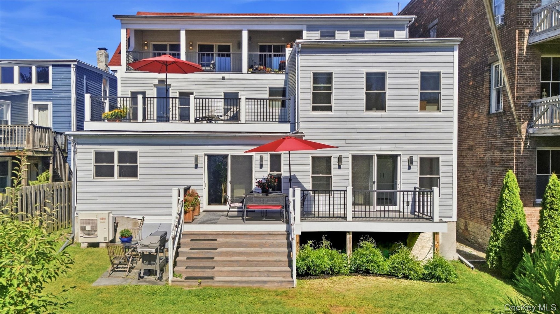 Back view. Decks on all three levels.