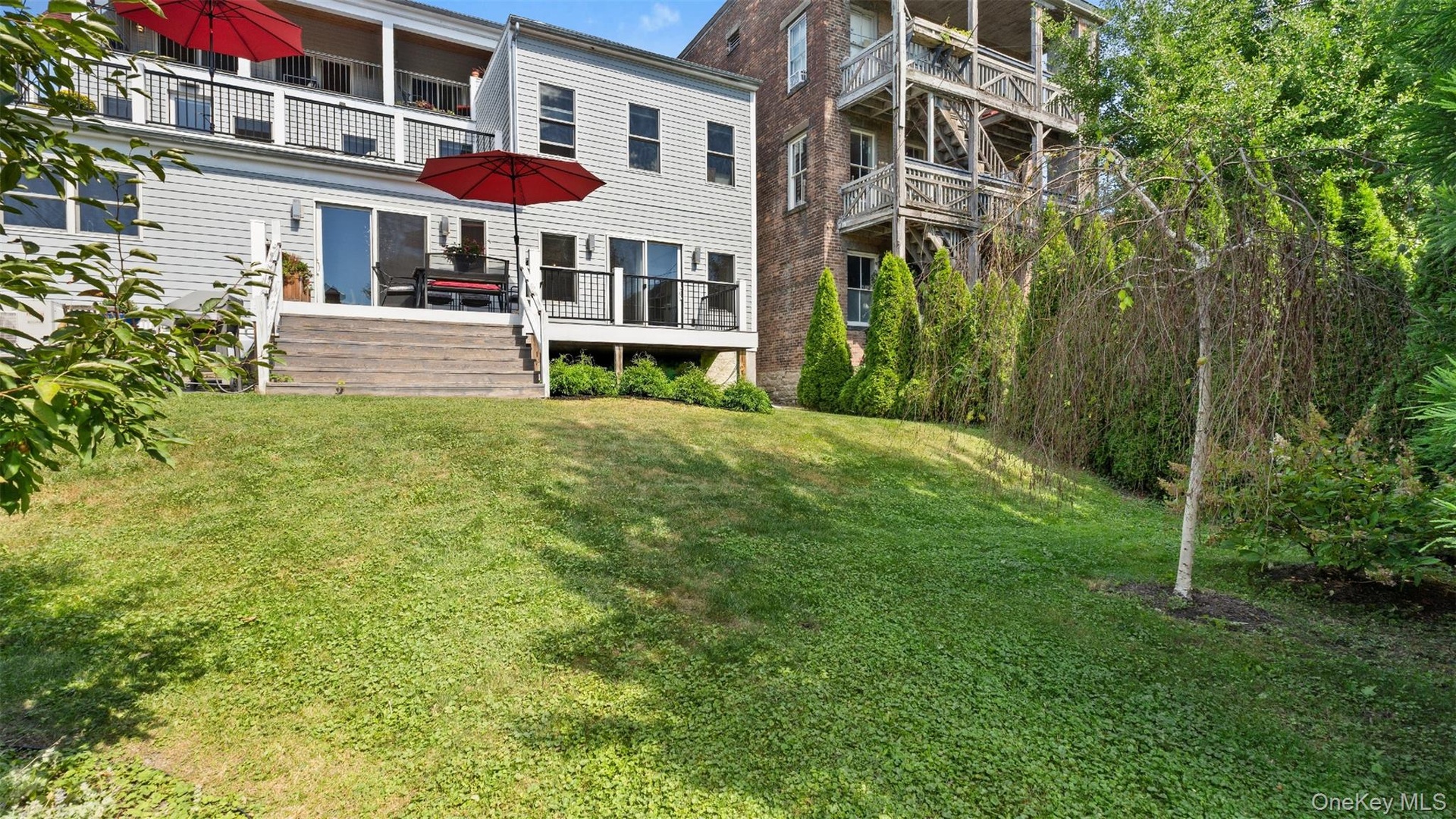 Fenced and gated back yard. Space for large gardens or a pool.