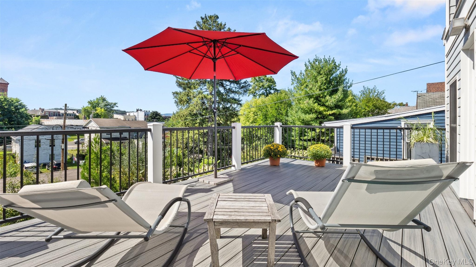 Private deck off primary bedroom.
