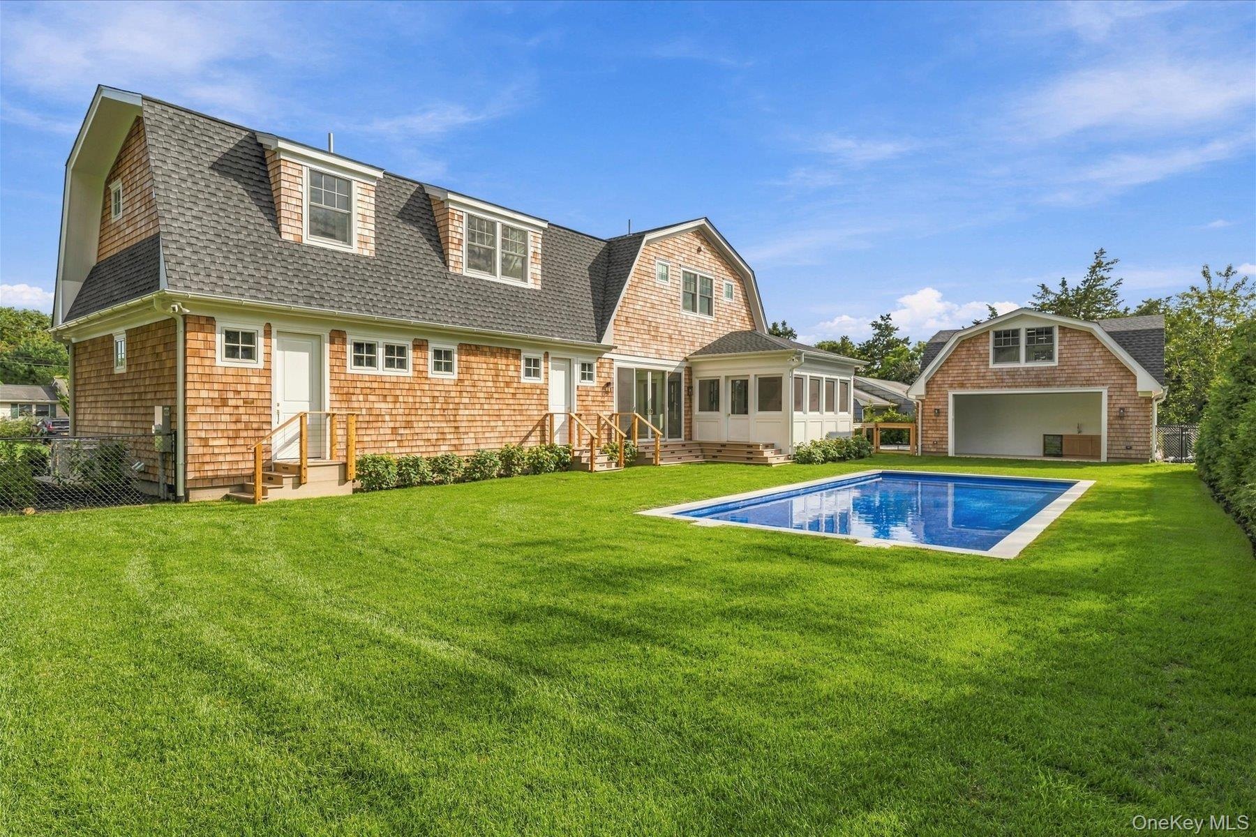 Backyard area with plenty of room for a fire pit area.