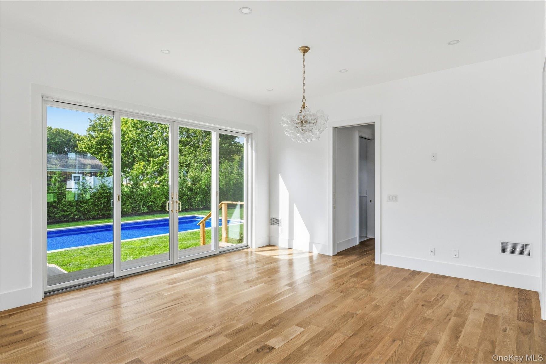 Dining Room with Hallway to Bathrooms and Master Suite