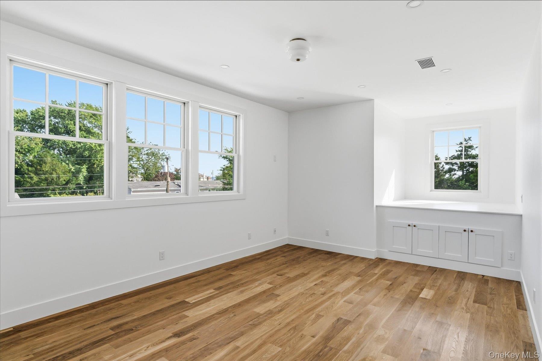 Bedroom 3 on second floor with built ins and extra large closets