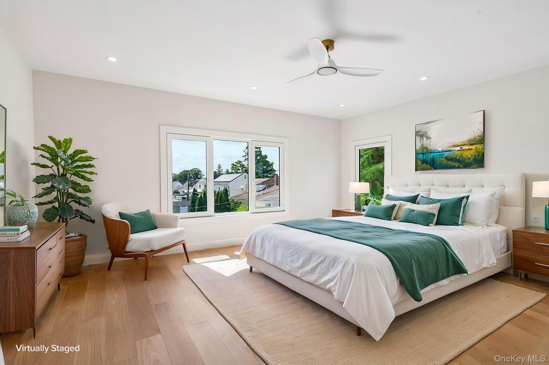 Recessed lighting, wood-finish flooring, white walls, and a ceiling fan