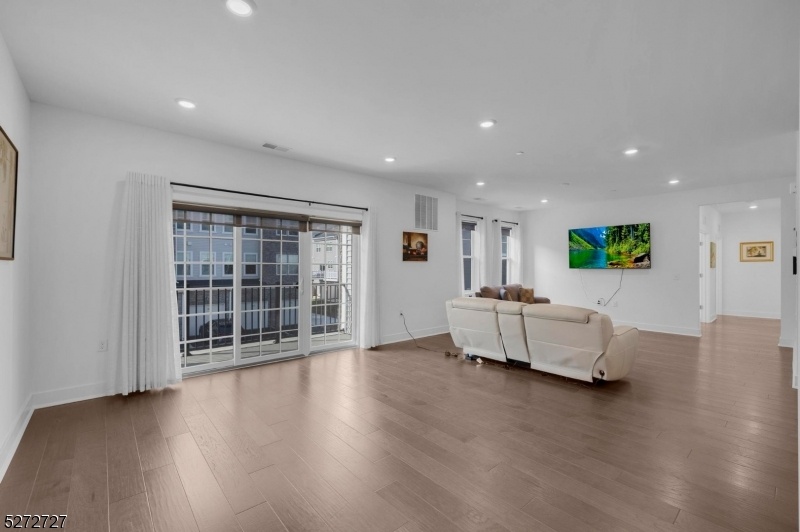 Living Room w/ Balcony access