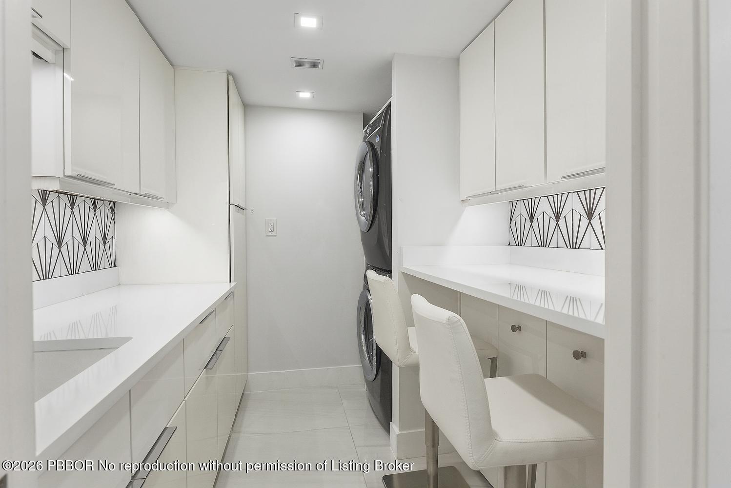 Laundry room with office space