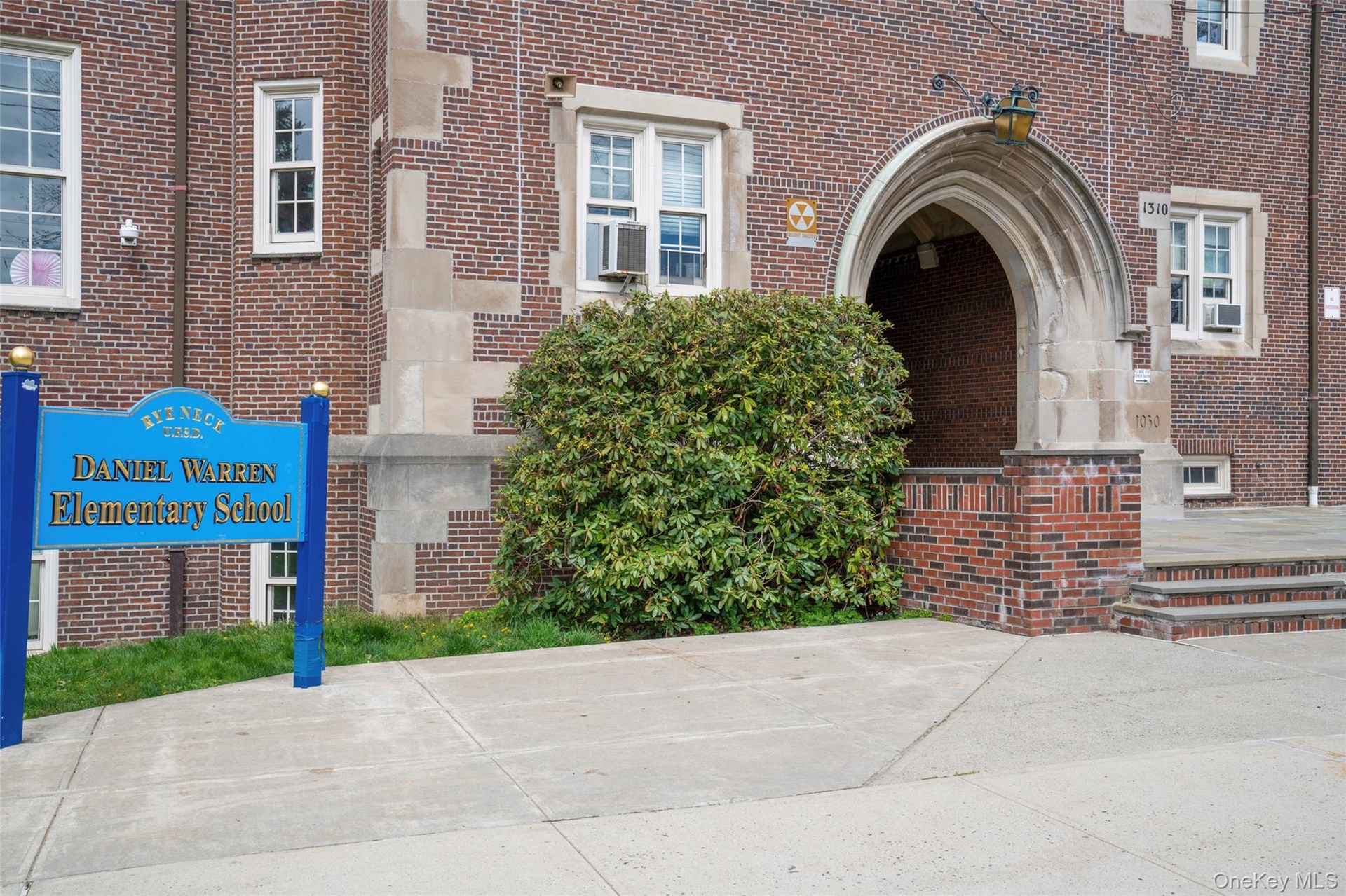 Daniel Warren Elementary School. Kindergarten, first and second grades. Circular drive for easy drop off.