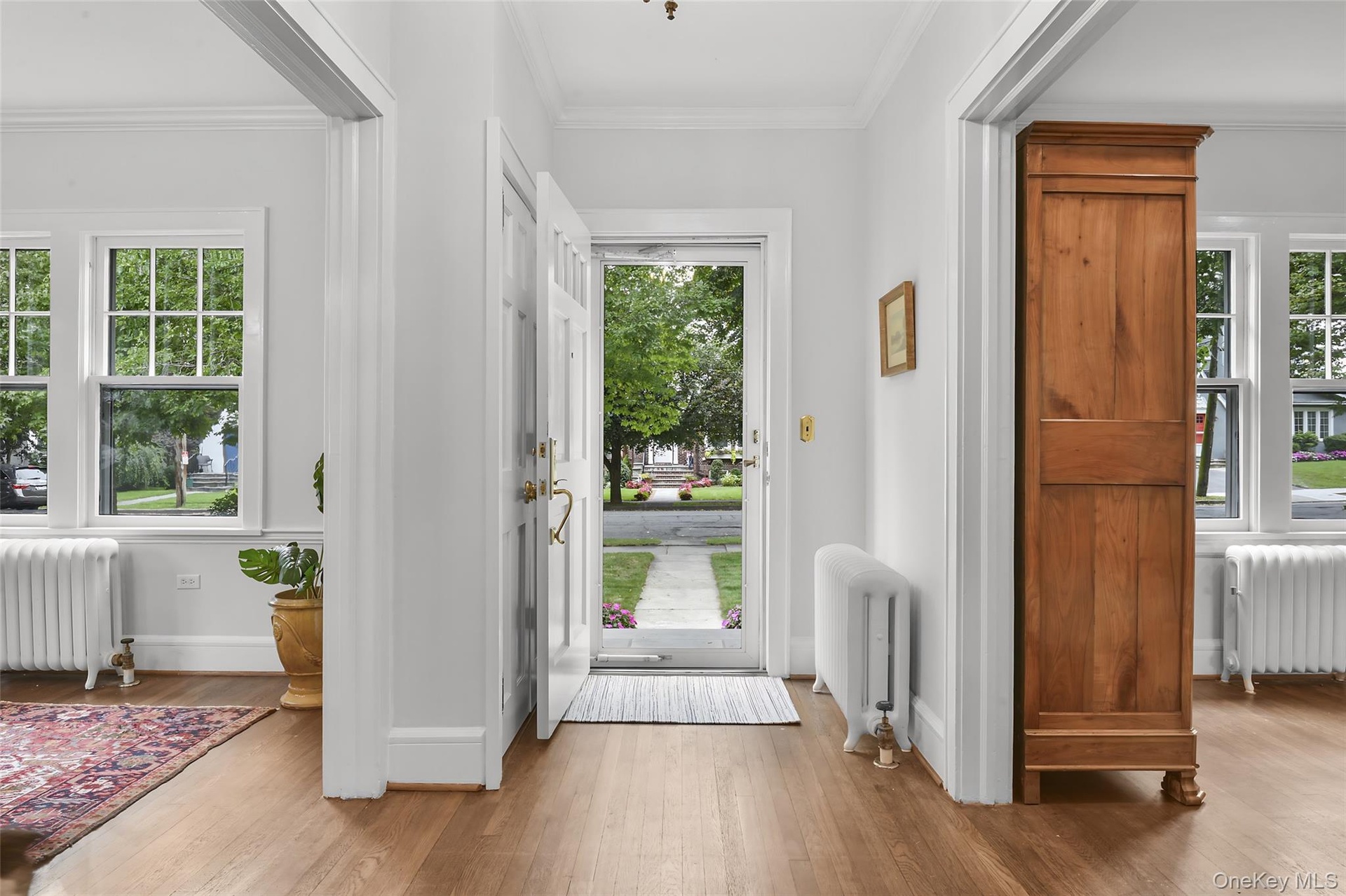 Entry with coat closet. Entry chandelier excluded.