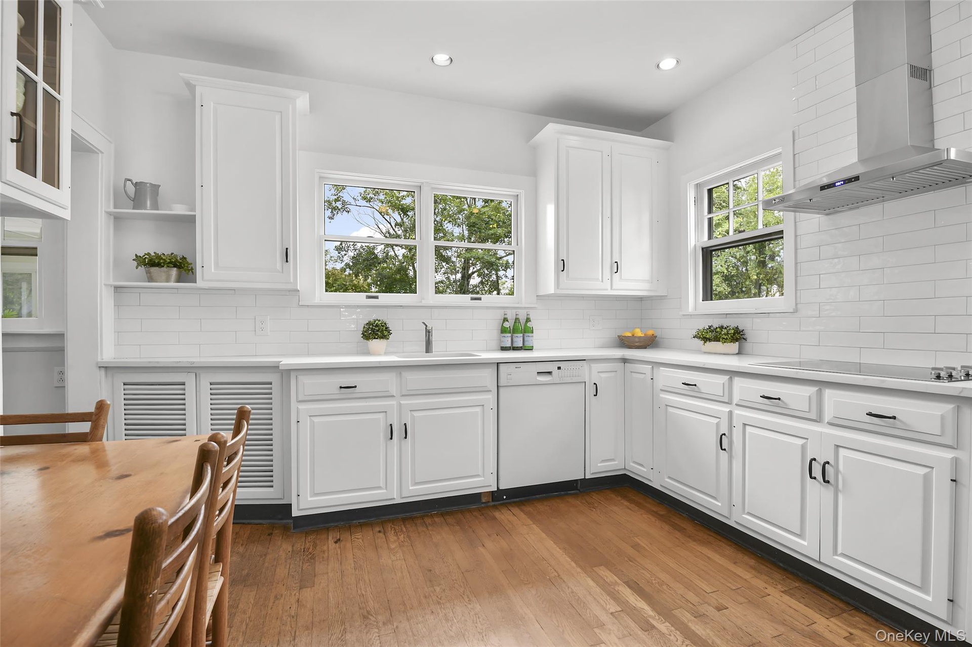 Kitchen has recessed lighting.
