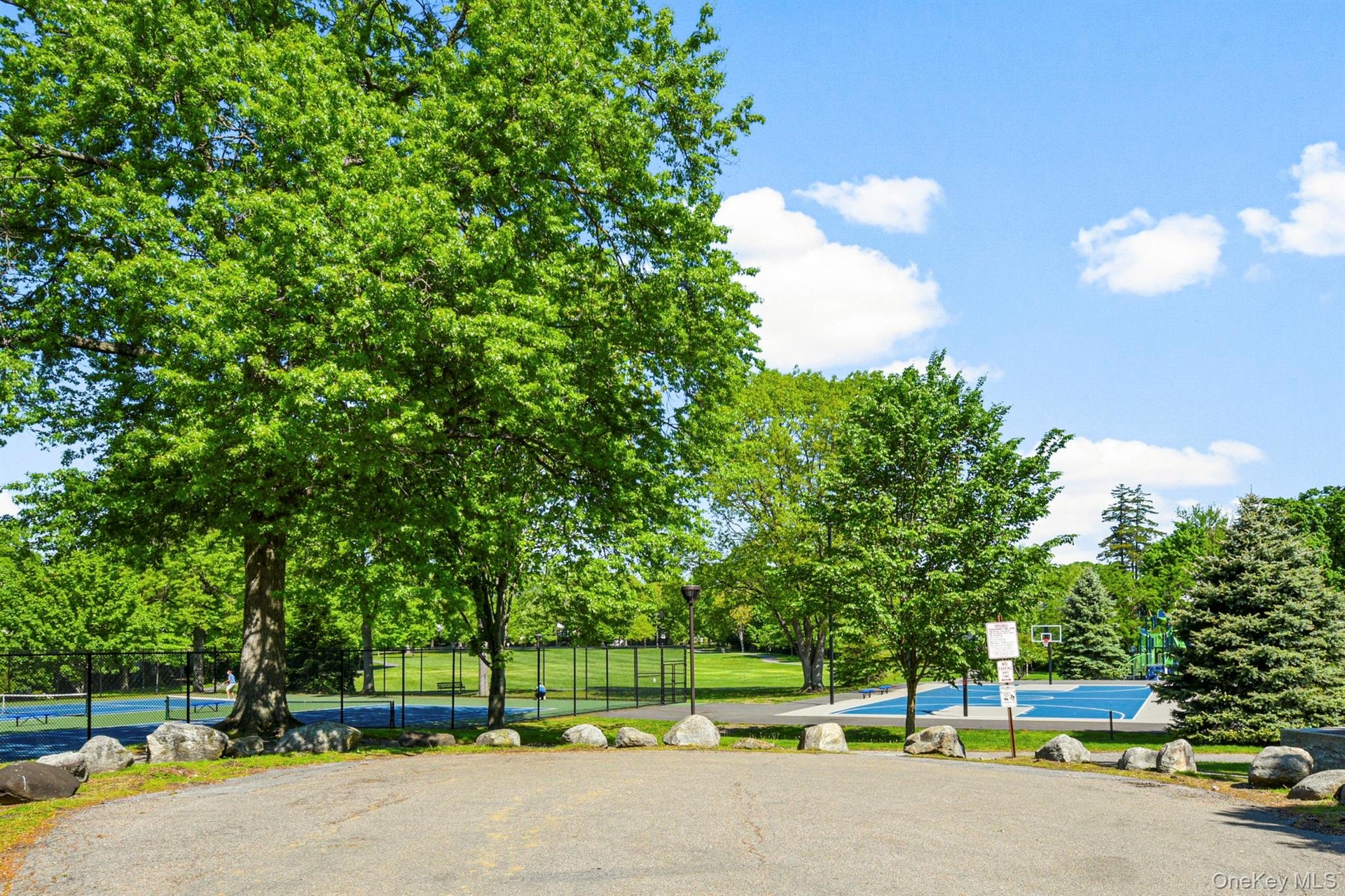 Another view of the neighborhood park (Florence) with activities for all ages.