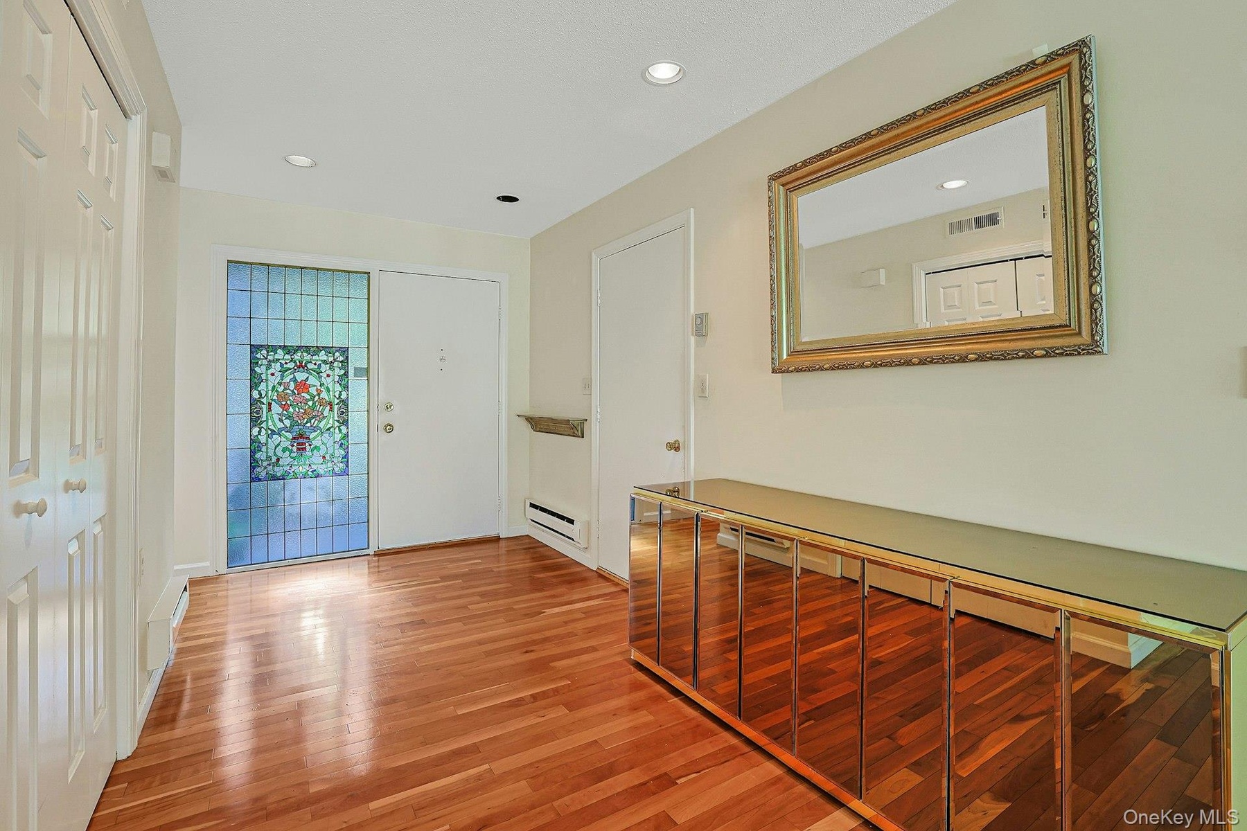 Front door and direct access to garage