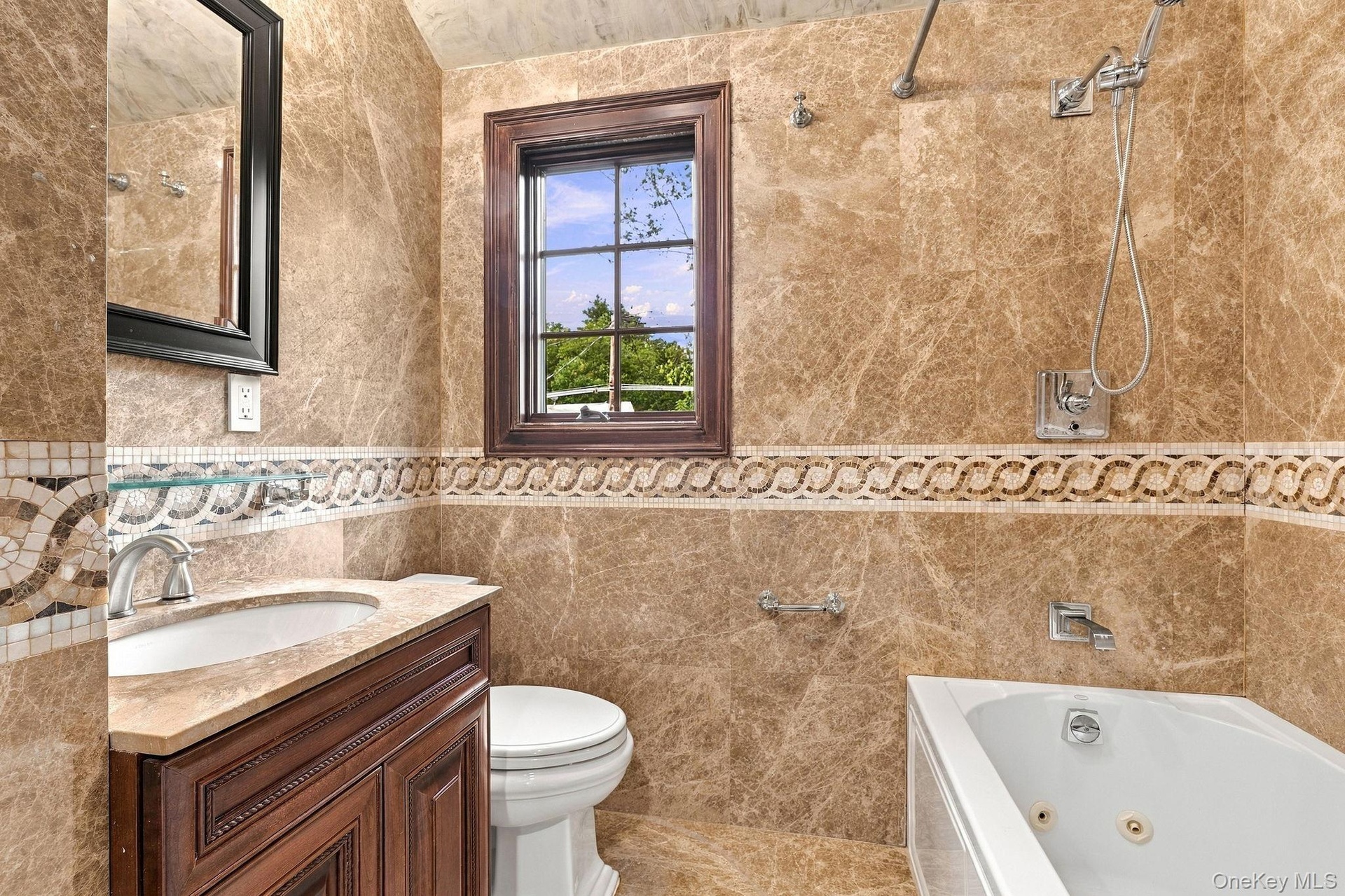 High-end finishes elevate the accessory apartment bath.