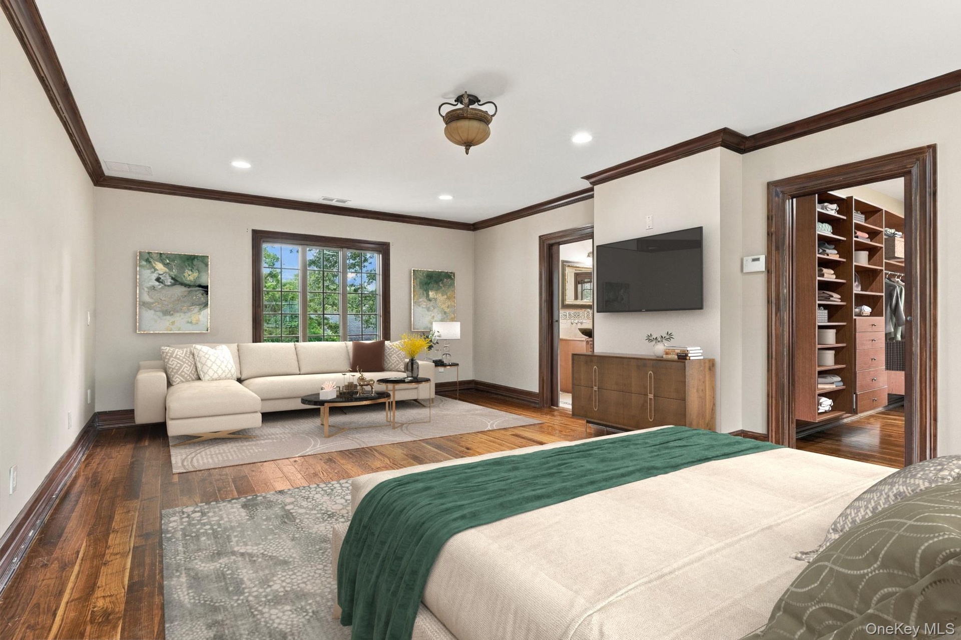 A primary suite with a luxurious sense of scale.