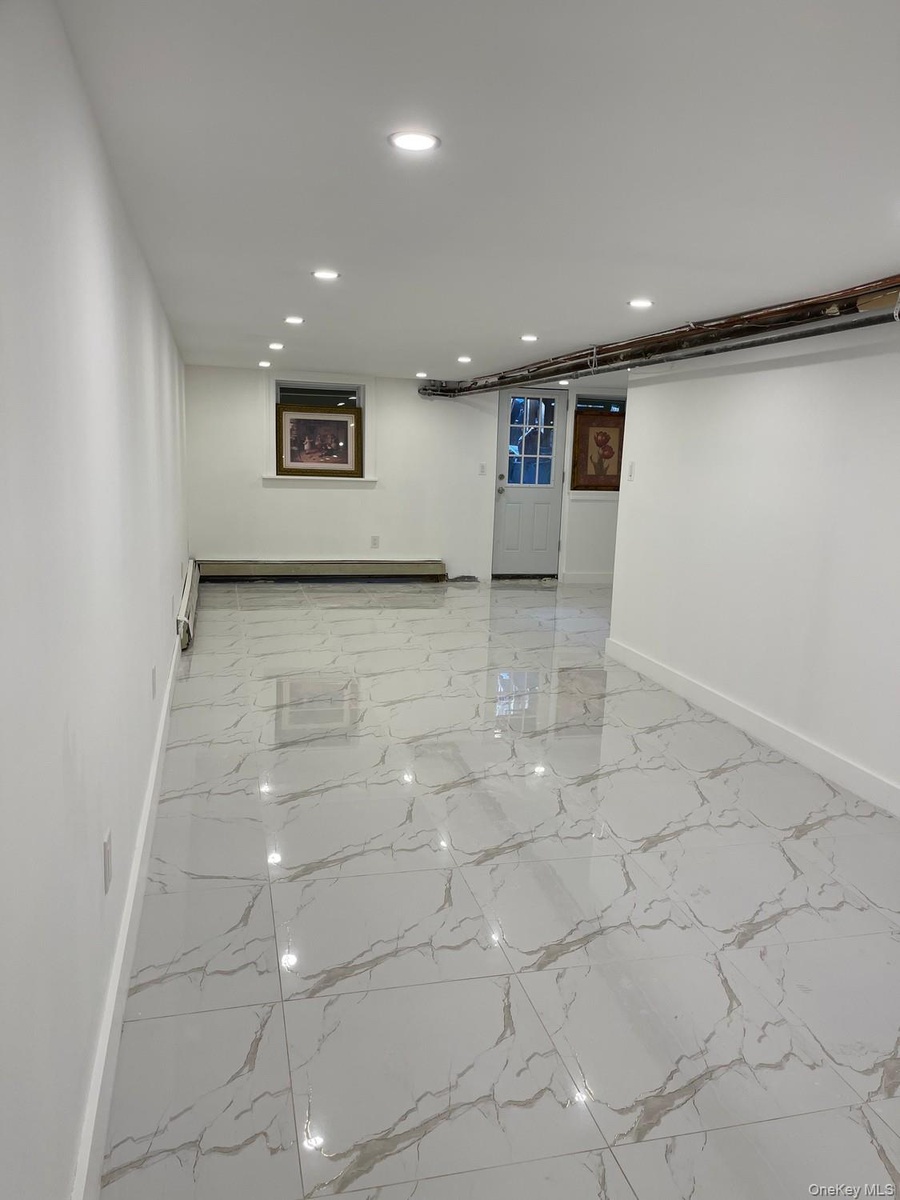 spacious finished basement With rear entrance