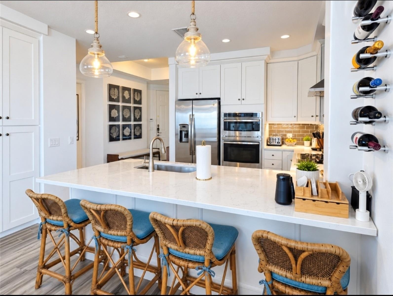 DIRECT OCEAN    FRONT CONDO WITH A WRAP-A-ROUND BALCONY.